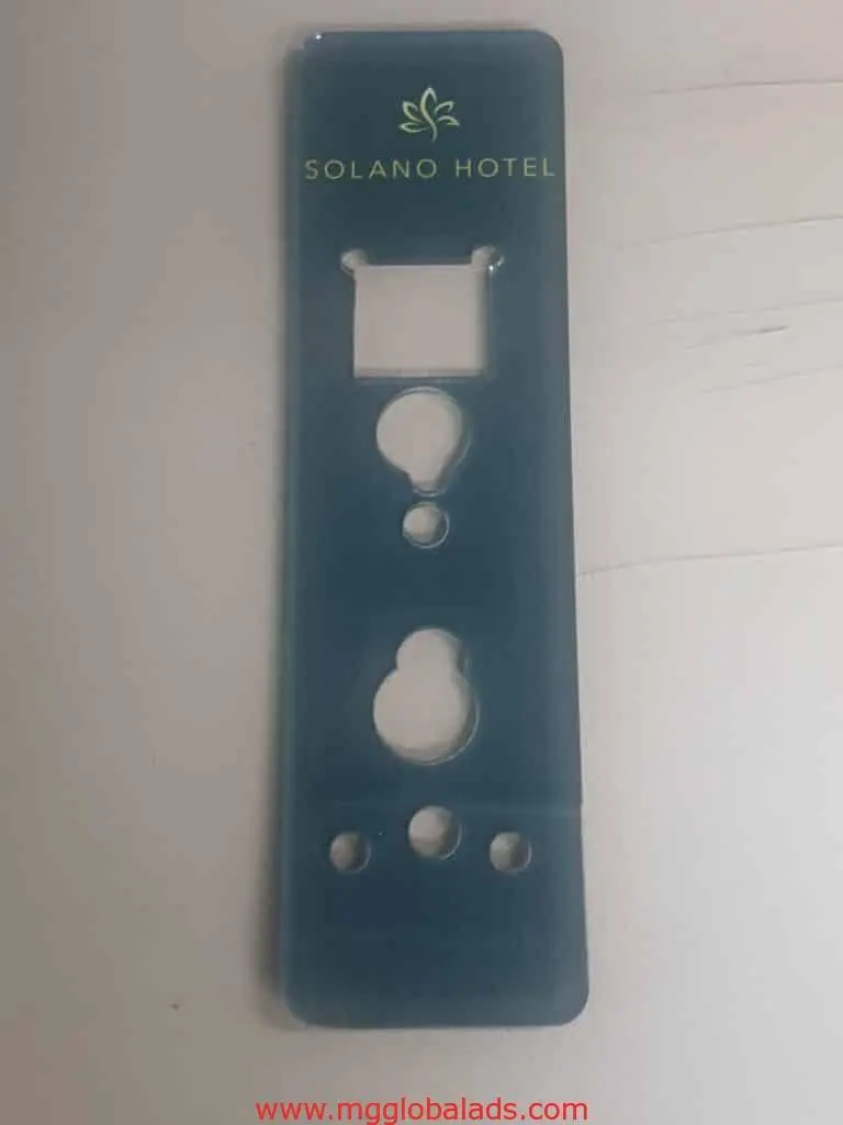 Acrylic hotel key tag signage for Solano Hotel with cut-out shapes, in Quezon City setting by M&G Global Ads.