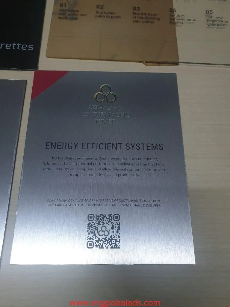 Acrylic signage for Arthaland at BGC showing energy-efficient systems and sustainability features by M&G Global Ads.