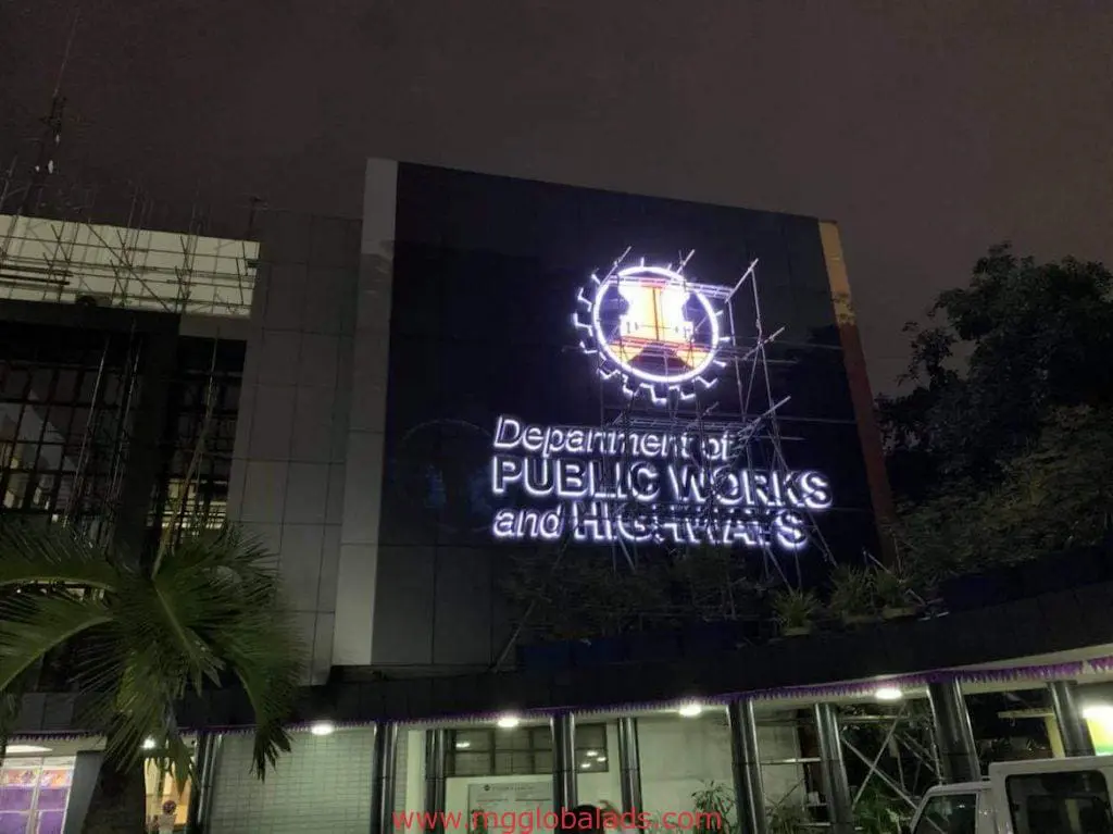 Illuminated outdoor building signage for Department of Public Works and Highways in Quezon City by M&G Global Ads.