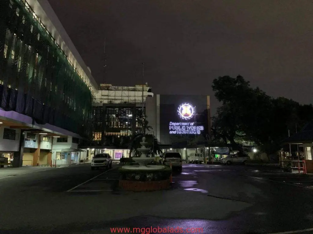 Illuminated acrylic signage for Department of Public Works and Highways, Quezon City exterior, by M&G Global Ads.