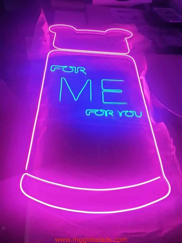 Neon bottle-shaped LED neon signage with FOR ME and FOR YOU in blue, glowing pink and purple in Makati by M&G Global Ads.