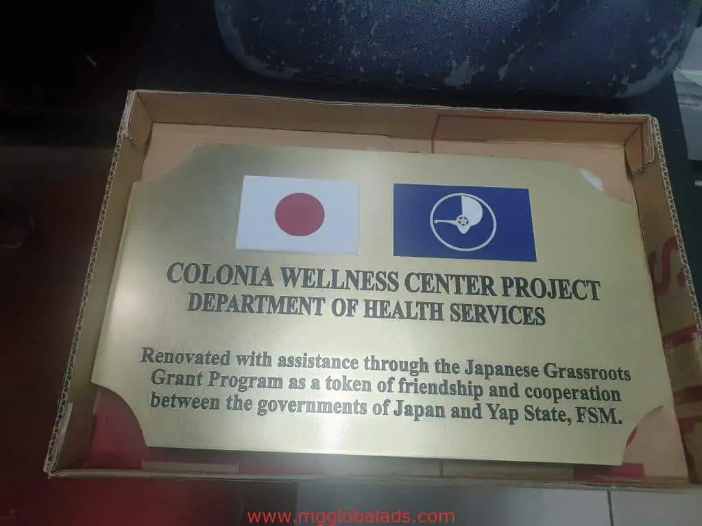 Gold plaque signage for Colonia Wellness Center client in Makati, elegant alternative to acrylic signs by M&G Global Ads.