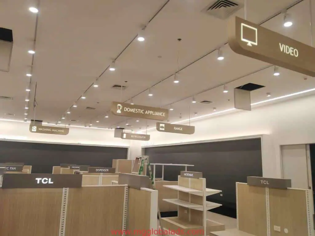 Metallic electronics store signage for “VIDEO,” “DOMESTIC APPLIANCE” in Makati, interior display by M&G Global Ads.