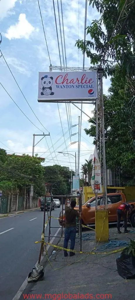 Metal signage for Charlie Wanton Special with panda logo installed roadside in Quezon City by M&G Global Ads.
