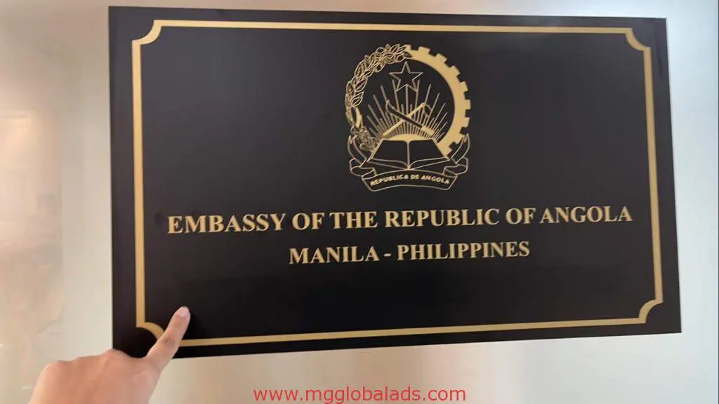 Metallic embassy signage for Republic of Angola client in Makati, featuring coat of arms, by M&G Global Ads.