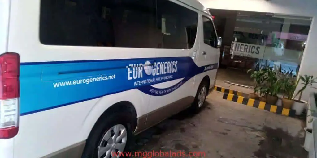 Acrylic signage for Euro Generics International Philippines at a building in Makati, with parked branded van by M&G Global Ads.