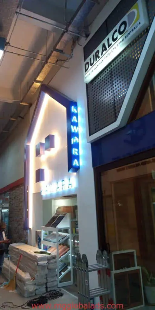 Blue neon and metallic KAWARA signs, acrylic DURALCO signage at a Makati shop, by M&G Global Ads.