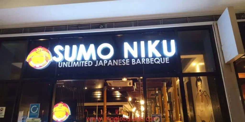 SUMO NIKU UNLIMITED JAPANESE BARBEQUE metallic signage with cartoon sumo wrestler, Makati branch, by M&G Global Ads.