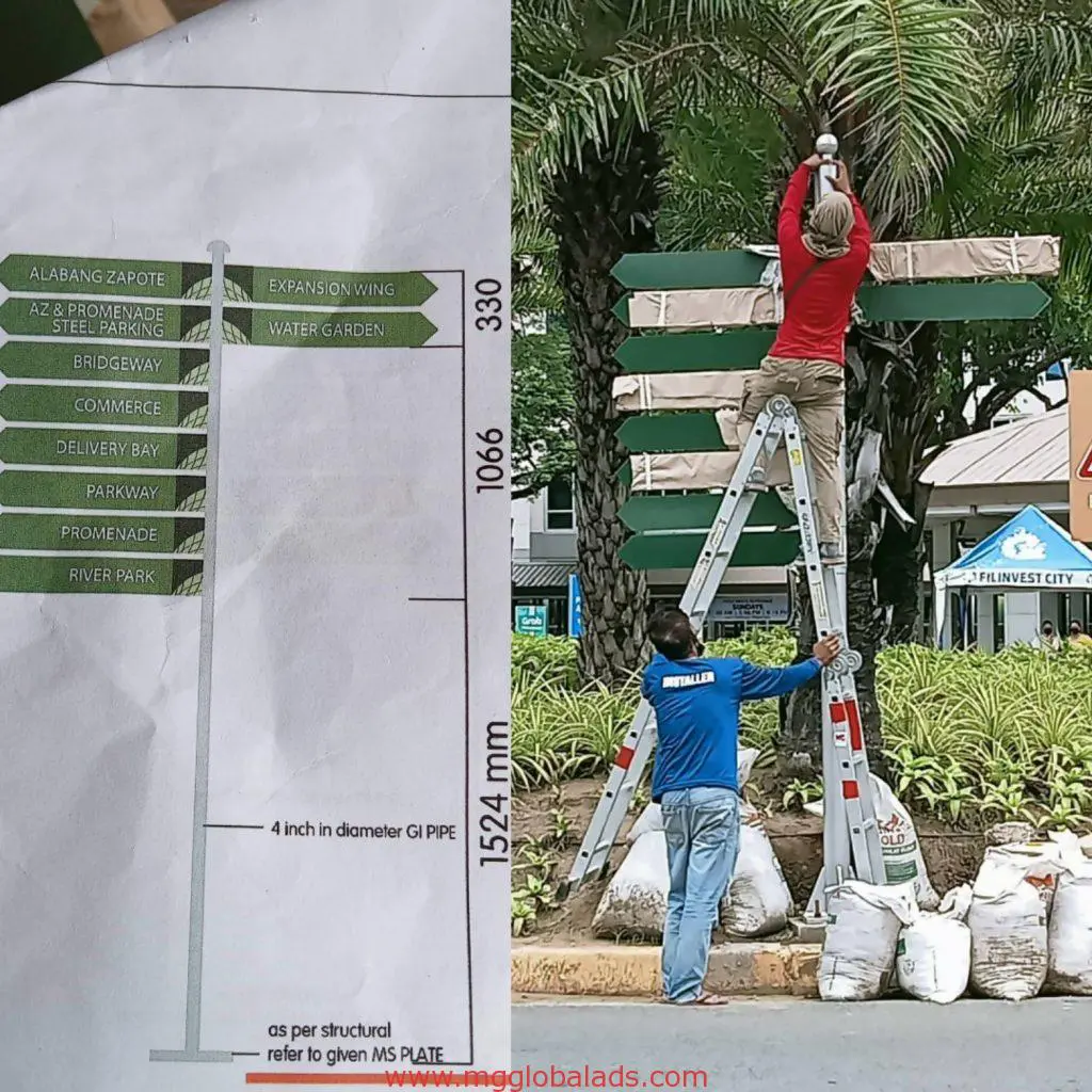 Installing metallic wayfinding directional signage on a pole in Quezon City, with diagram, by M&G Global Ads.
