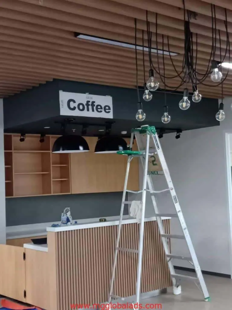 Acrylic indoor coffee signage for a modern café in Ortigas under construction, by M&G Global Ads.
