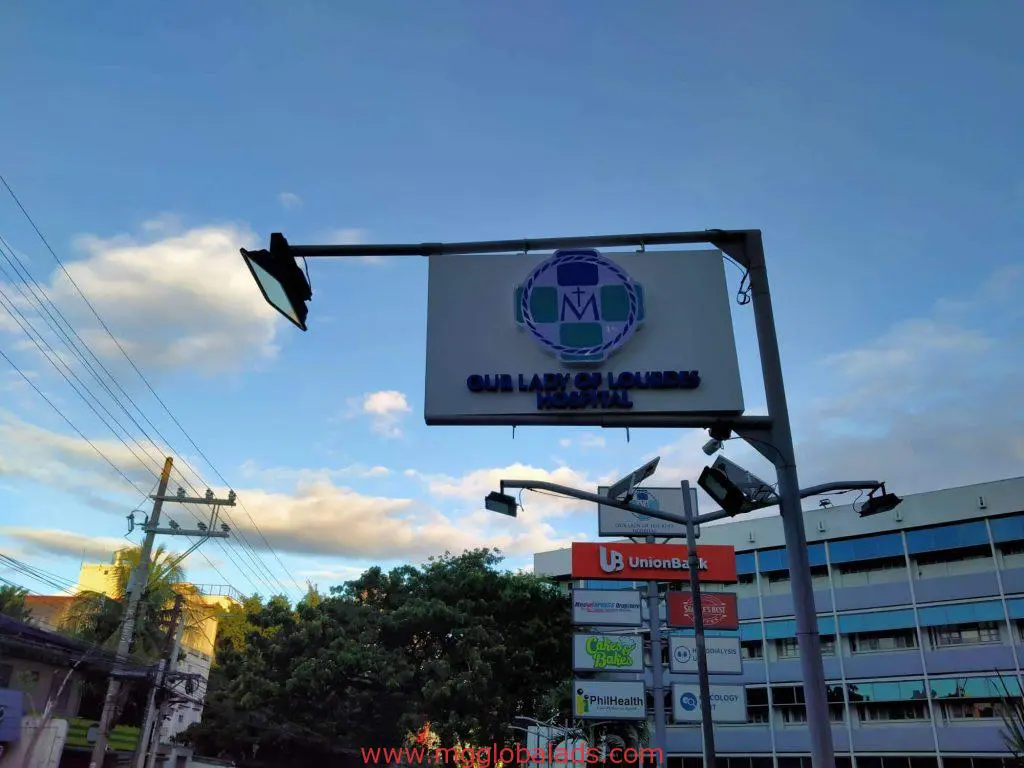 Metallic hospital signage for Our Lady of Lourdes and UnionBank in Quezon City, outdoor installation by M&G Global Ads.