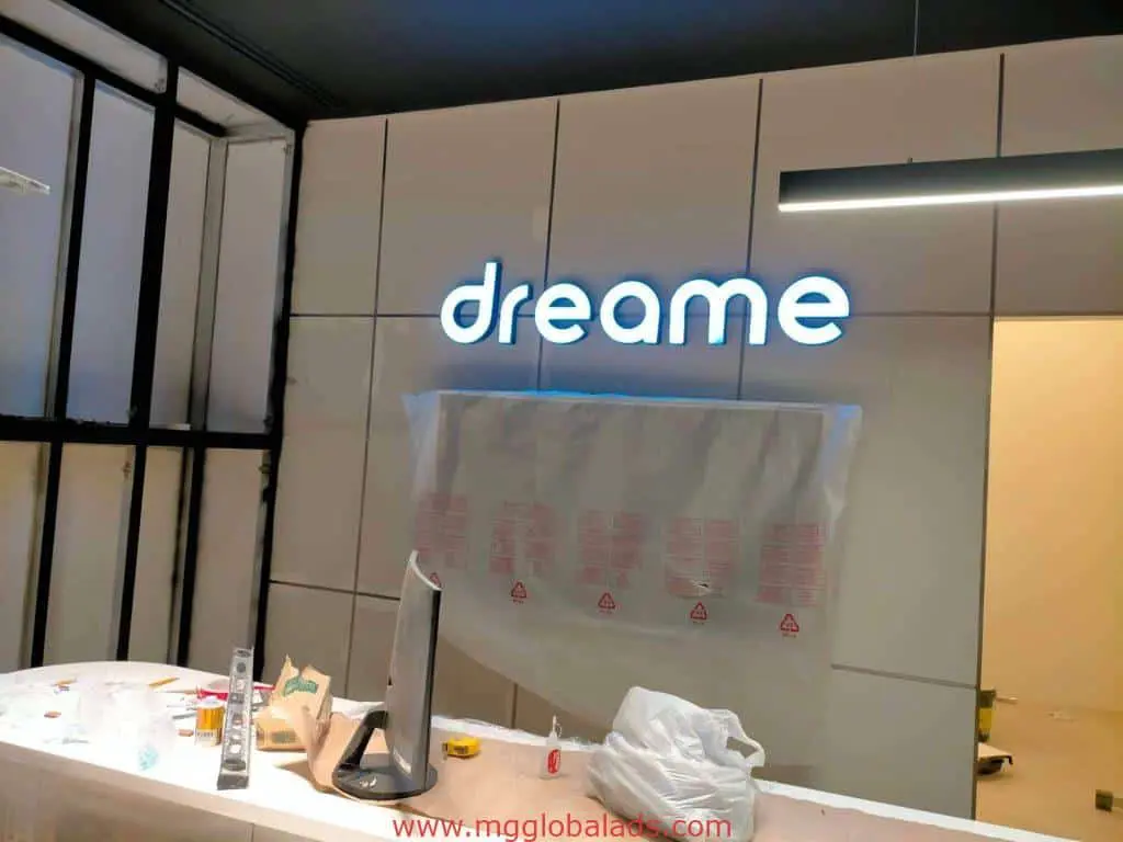 White LED signage for dreame on a tiled wall in Mandaluyong, renovation underway, by M&G Global Ads.