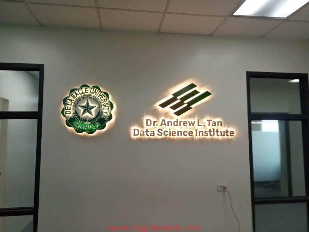 Illuminated acrylic indoor signage for De La Salle University in Makati, showing the Dr. Andrew L. Tan Data Science Institute by M&G Global Ads.