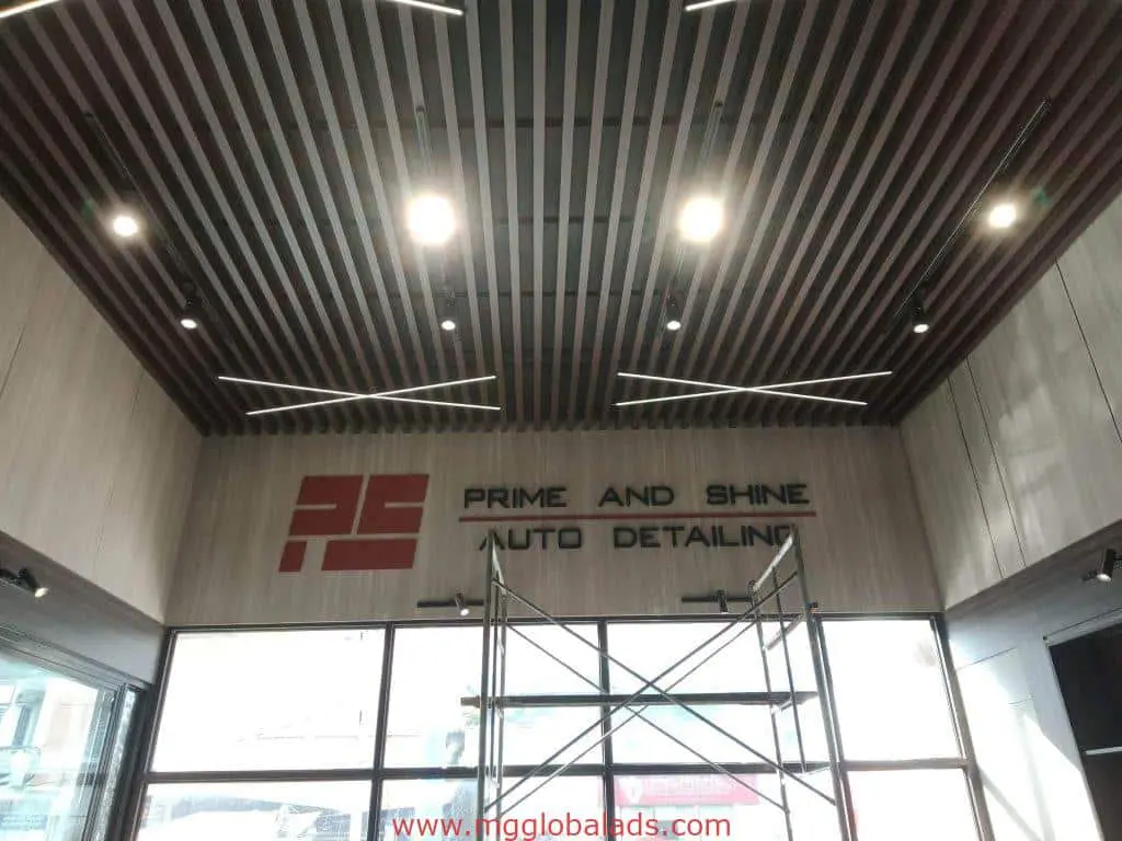 Acrylic signage for Prime and Shine Auto Detailing in Makati, modern shop with wood ceiling, by M&G Global Ads.
