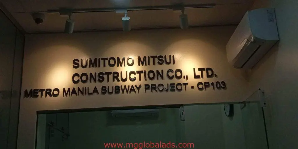 Indoor office acrylic building signage for Sumitomo Mitsui in Pasig above glass door, Metro Manila Subway Project by M&G Global Ads.