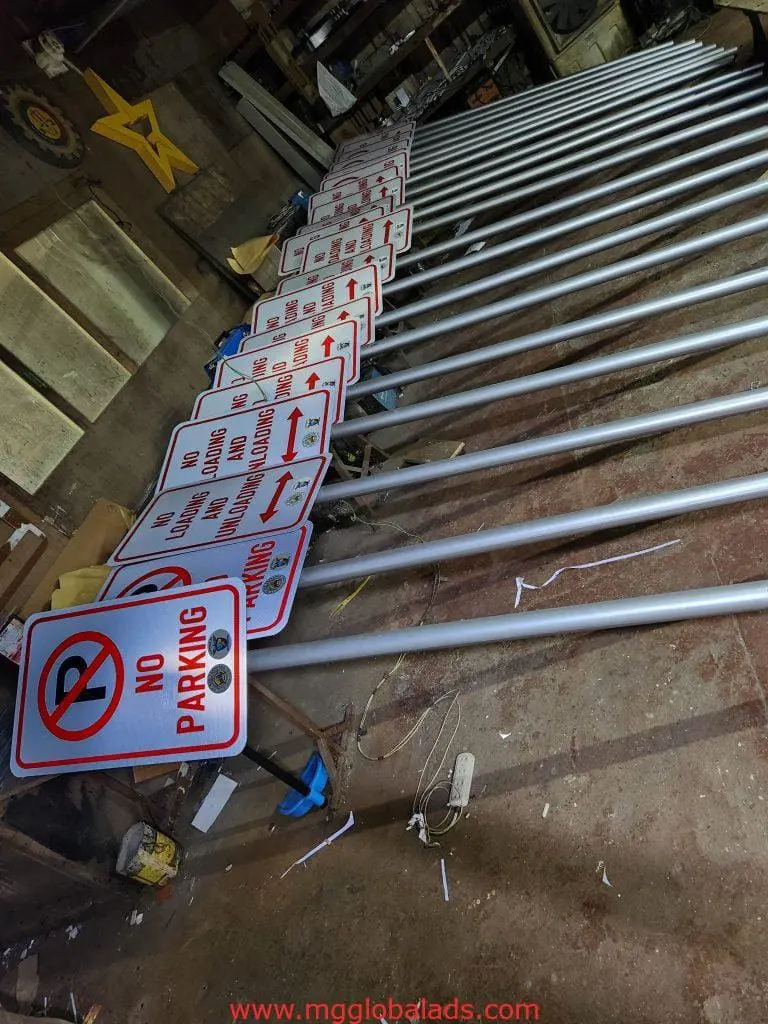 No Parking metal signs with poles, outdoor signage for Makati installation, arranged in workshop by M&G Global Ads.