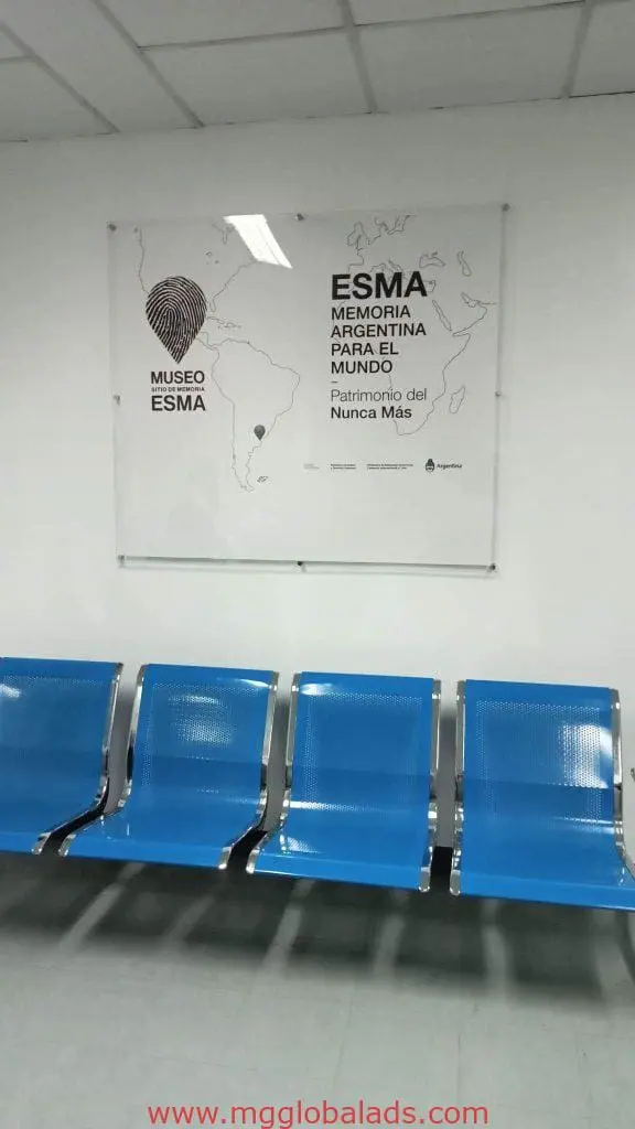 Metal building signage for Museo ESMA with map and fingerprint, chairs in front. Makati project by M&G Global Ads.