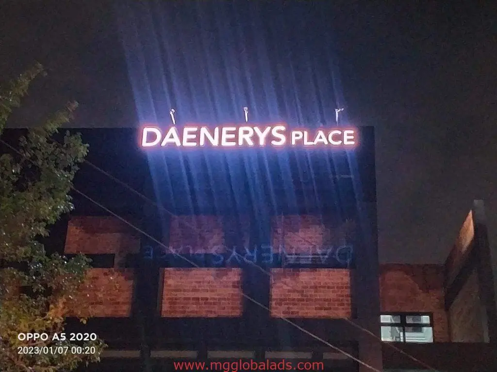 Bright pink acrylic rooftop signage for Daenerys Place in Quezon City at night by M&G Global Ads.