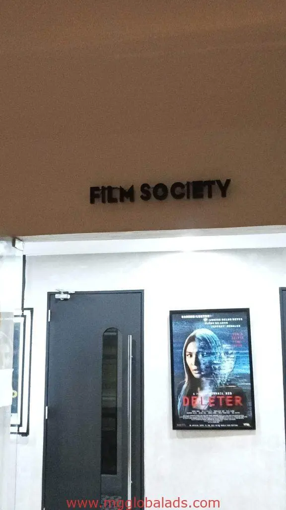 Metallic FILM SOCIETY building signage, client Film Society, Ortigas. Movie poster for DELETER visible. By M&G Global Ads.