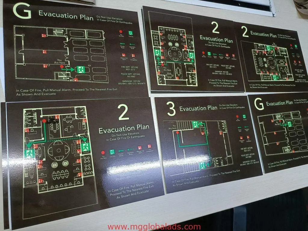 Evacuation plans and acrylic fire exit signage for client in Makati: floor diagrams, exits, safety notes by M&G Global Ads.