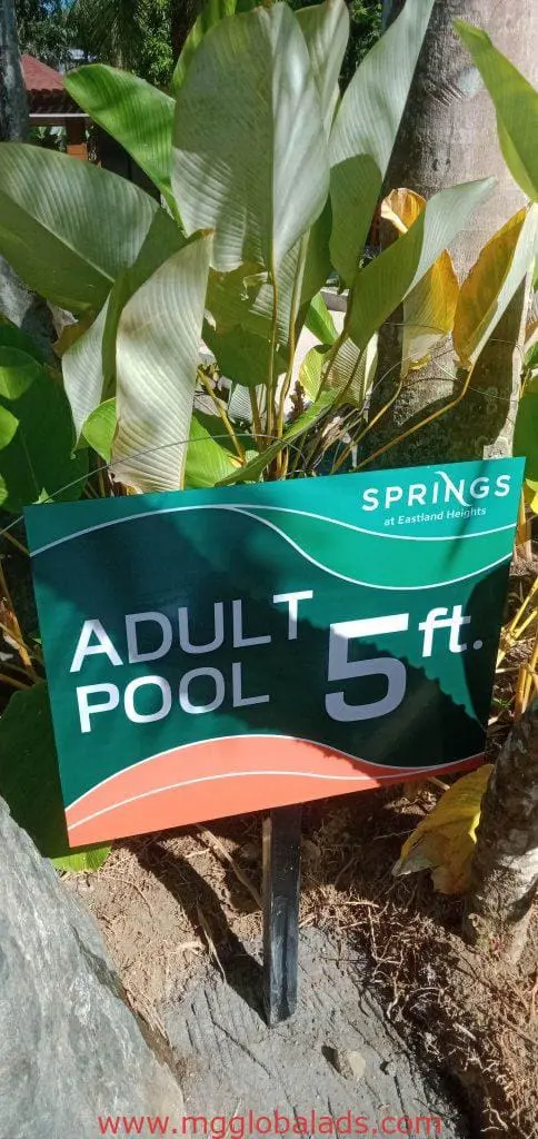 Acrylic ADULT POOL signage for SPRINGS at Eastland Heights in Quezon City, green and orange, by M&G Global Ads.