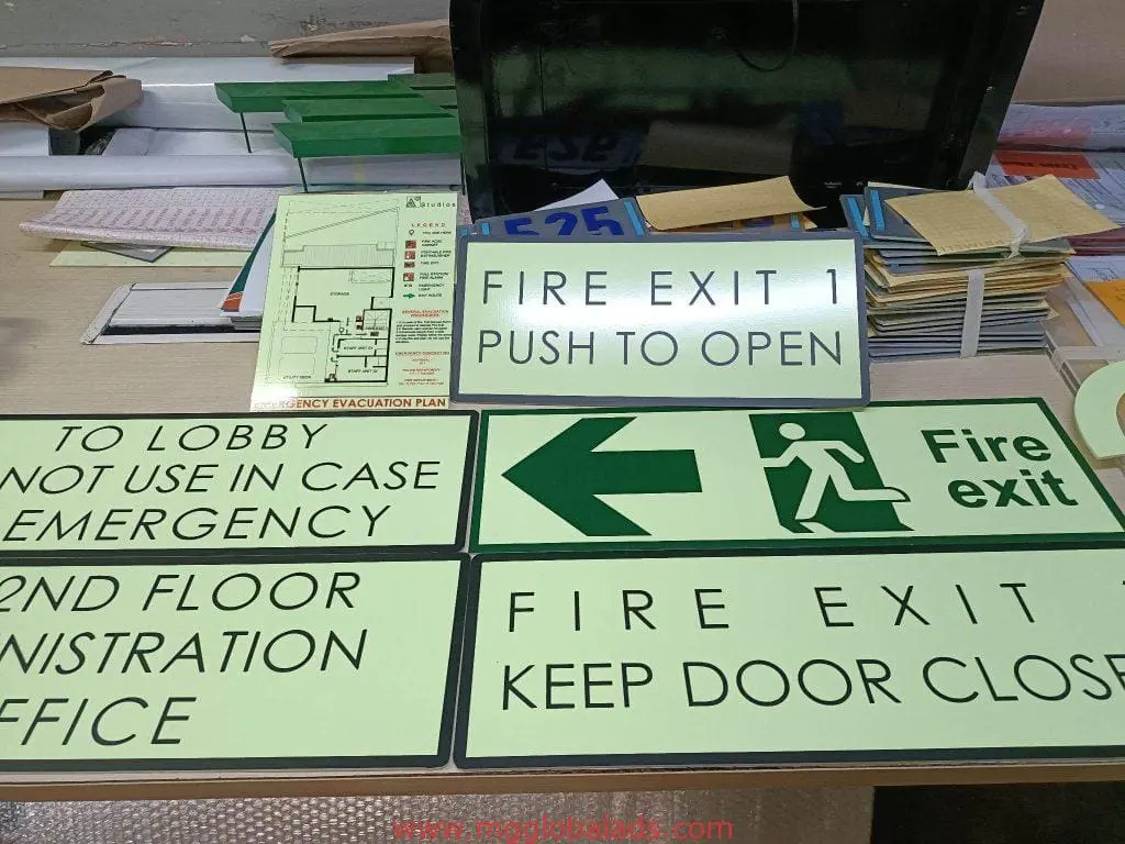 Building signage: acrylic and metallic fire exit, lobby, administration office signs plus map, Makati location by M&G Global Ads.