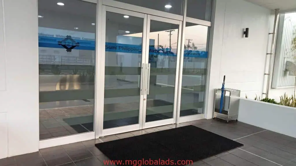 Office glass door signage for Sumi Philippines Wiring Systems in Makati with frosted stripes, by M&G Global Ads.