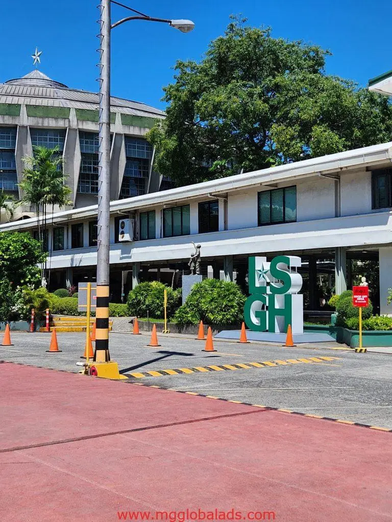 LSGH green acrylic signage at campus entrance in San Juan with trees and dome by M&G Global Ads.