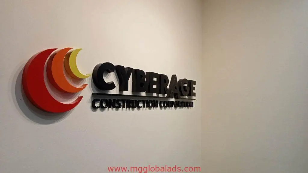 Modern acrylic signage for CYBERAGE Construction Corporation in Quezon City, with bold name and colored crescents, by M&G Global Ads.