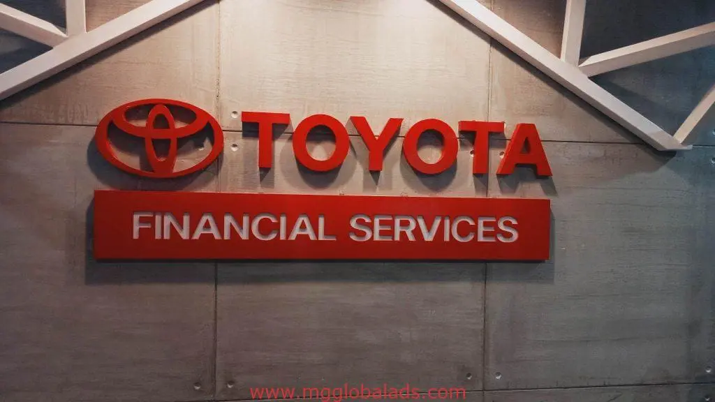 Toyota Financial Services acrylic office signage for Toyota, gray background, Makati branch wall display by M&G Global Ads.
