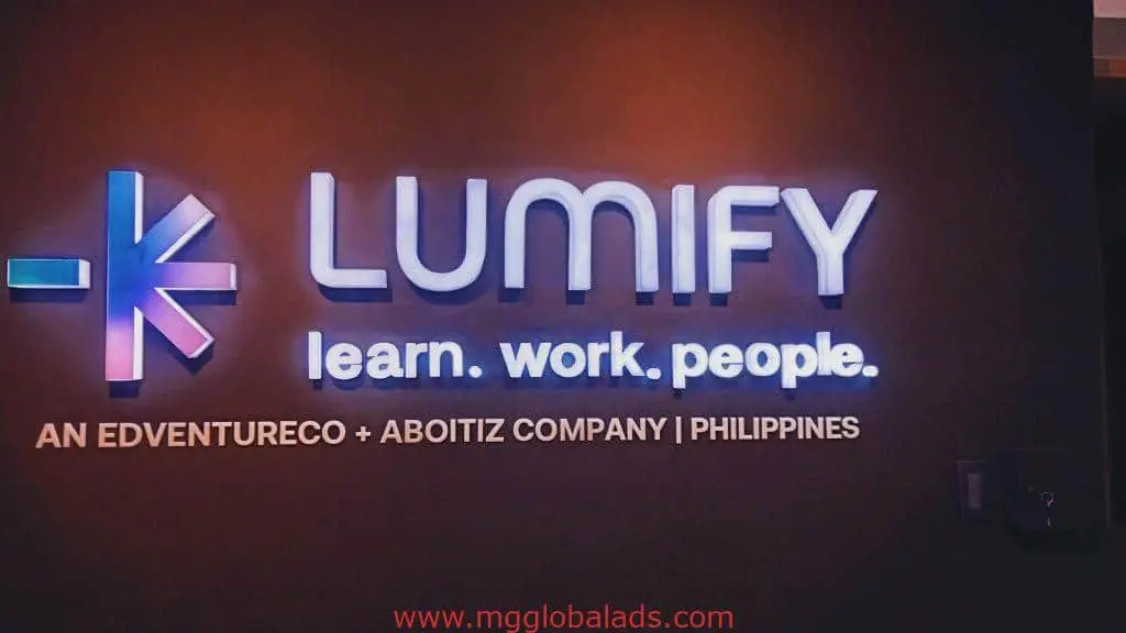 Illuminated LED building signage for Lumify in Makati showing tagline learn. work. people. by M&G Global Ads.