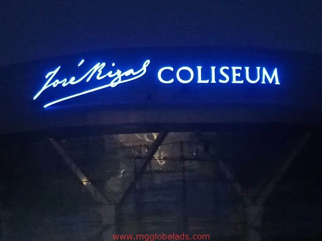 Neon LED signage for José Rizal COLISEUM in bold blue, Ortigas location, cursive and block letters, by M&G Global Ads.