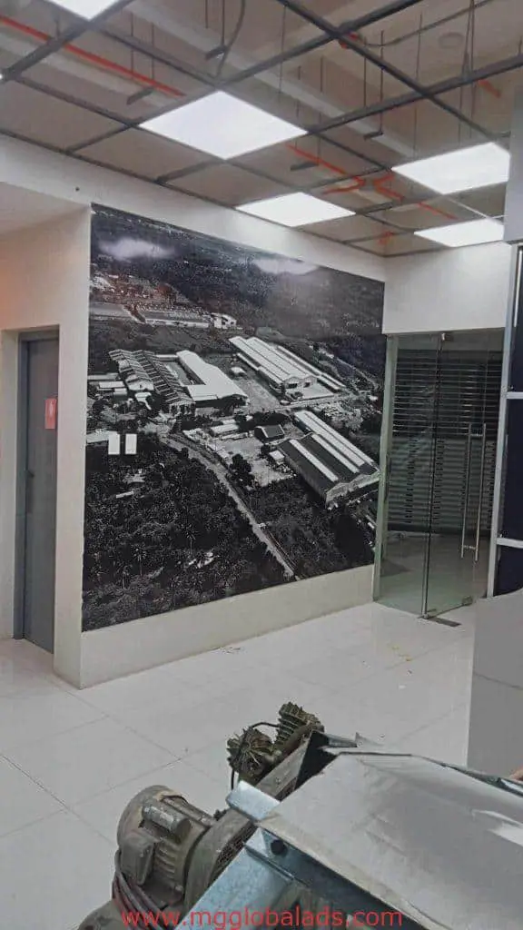 Acrylic office signage in Makati, modern interior with glass doors and industrial photo decor by M&G Global Ads.
