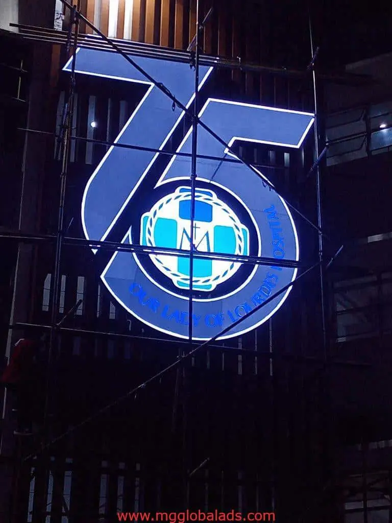 LED anniversary signage for Our Lady of Lourdes Hospital in Makati, blue white logo, night view, by M&G Global Ads.