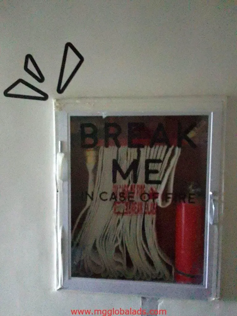Fire safety signage wall box in Makati with BREAK ME IN CASE OF FIRE, hose, extinguisher, by M&G Global Ads.