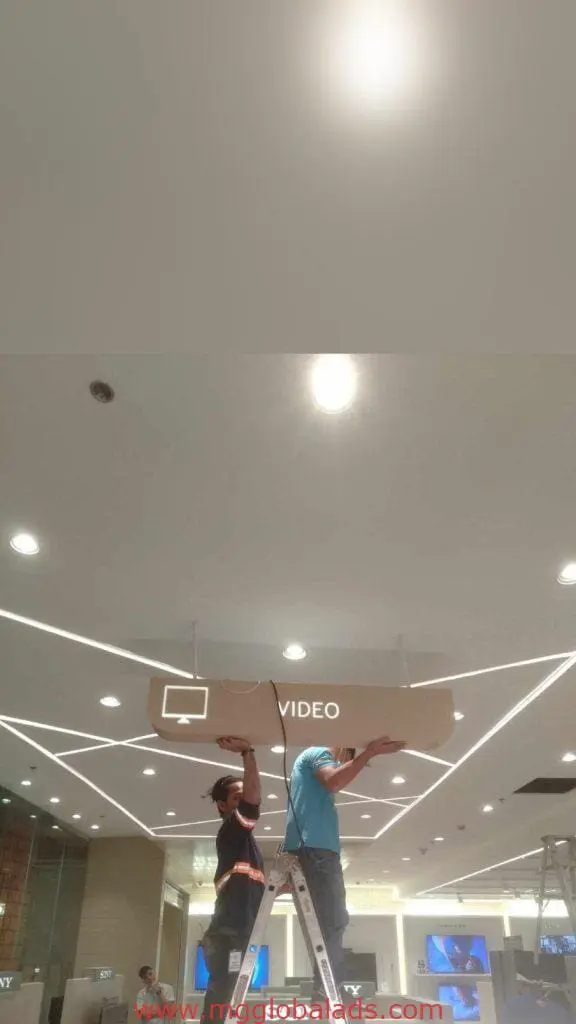 Acrylic indoor signage installation labeled VIDEO in a modern Ortigas building, geometric lights—by M&G Global Ads.