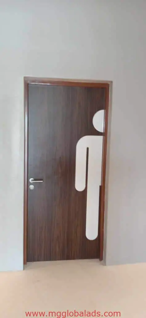 Minimalist white male building signage on a closed wooden door in a light hallway, Makati location by M&G Global Ads.