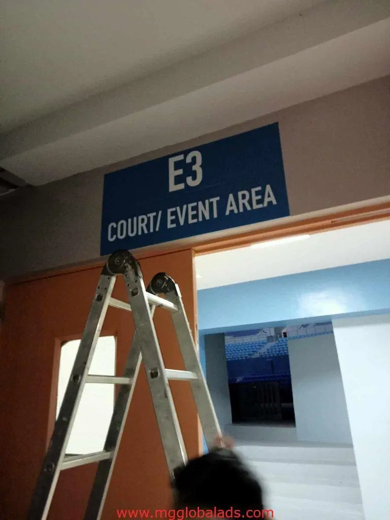 Blue acrylic event venue signage for E3 Court/Event Area at an indoor sports venue in Mandaluyong by M&G Global Ads.