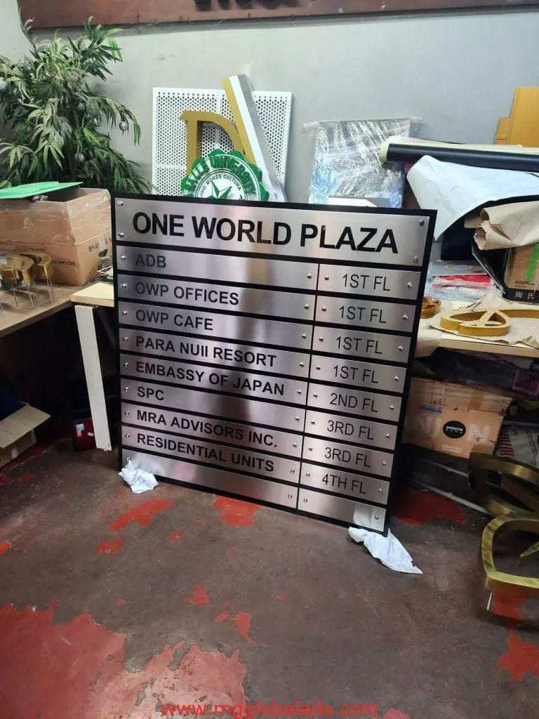 Indoor directory signage for One World Plaza offices in Makati with listed floors, by M&G Global Ads.