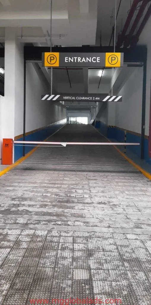 Indoor parking garage entrance with yellow LED entrance signage, 2.4m clearance in Makati, by M&G Global Ads.