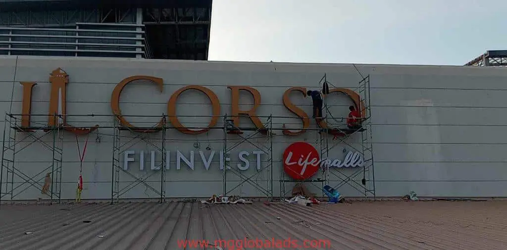 Metallic building signage installation for FILINVEST Life Malls in Ortigas by M&G Global Ads.