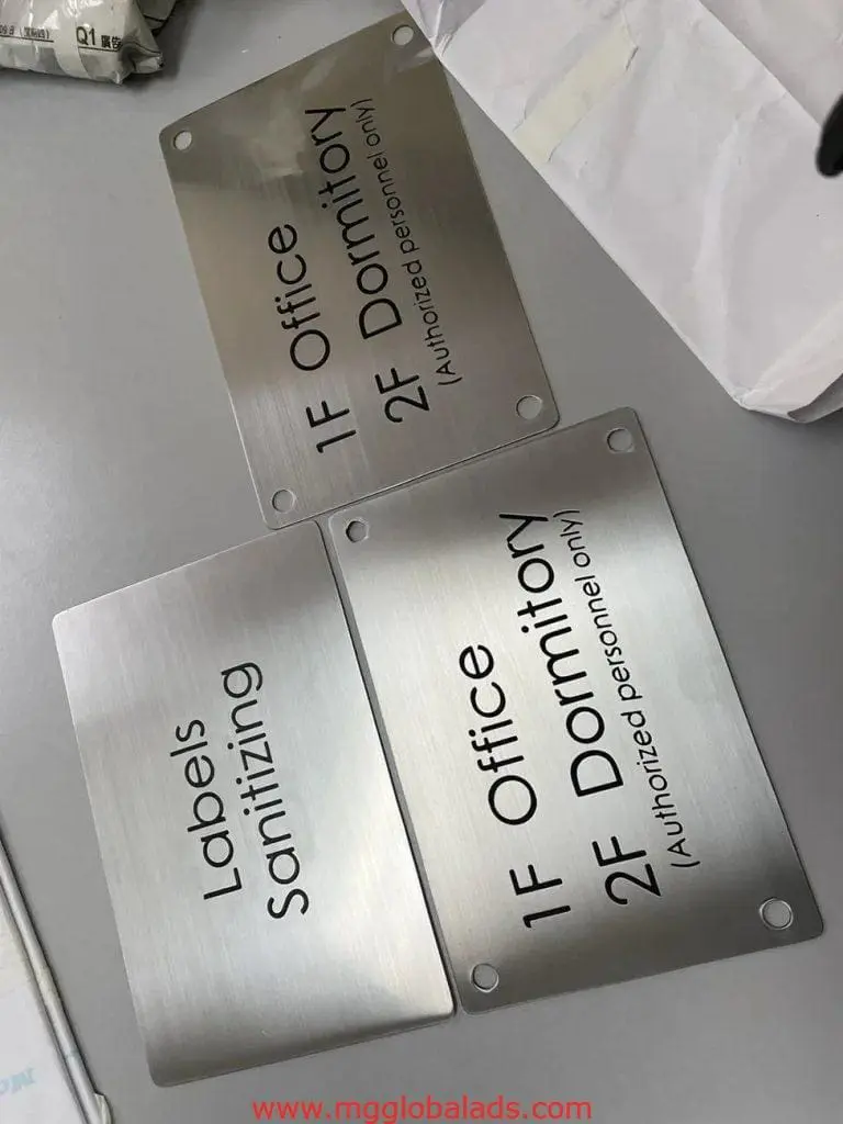 Brushed stainless engrave office and dormitory signage for building in Makati, with Labels Sanitizing sign, by M&G Global Ads.