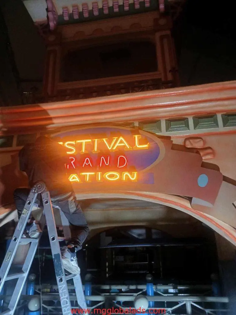 LED neon outdoor signage installation for FESTIVAL GRAND STATION in Makati at night by M&G Global Ads.