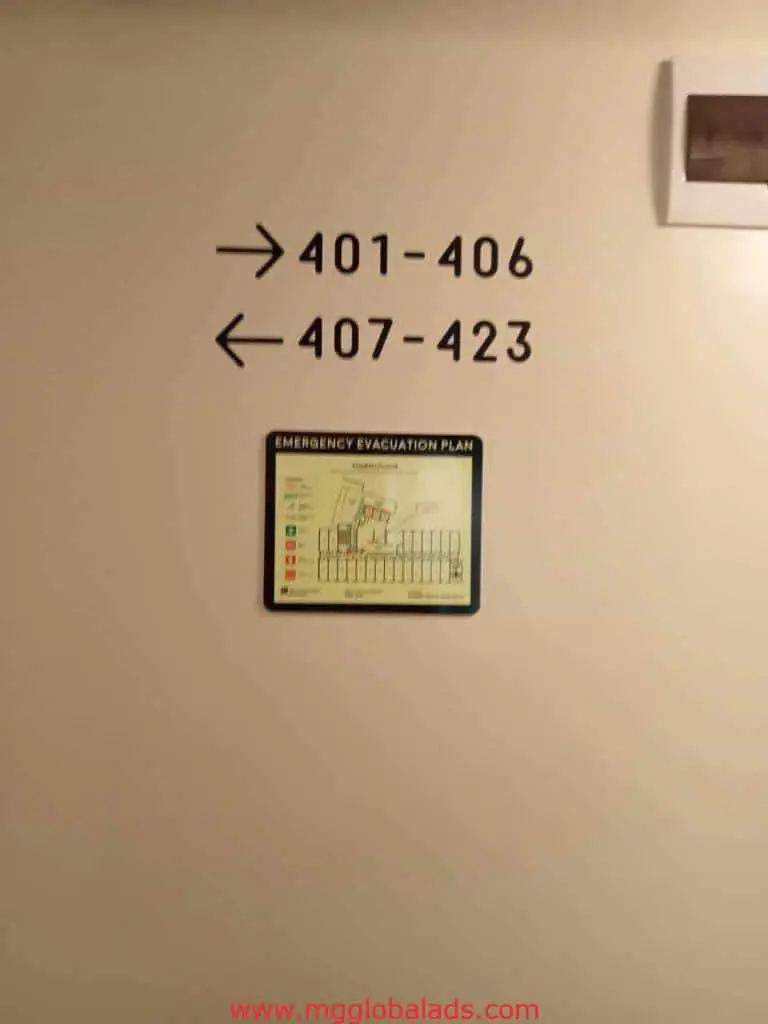 Directional room number wayfinding signage and emergency evacuation map in Makati by M&G Global Ads.