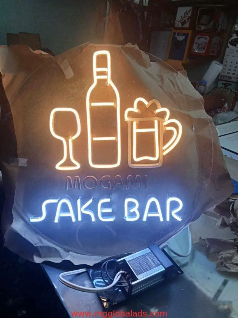 LED neon acrylic signage for Mogami Sake Bar with wine glass, sake bottle, and beer mug in white/yellow in Makati by M&G Global Ads.