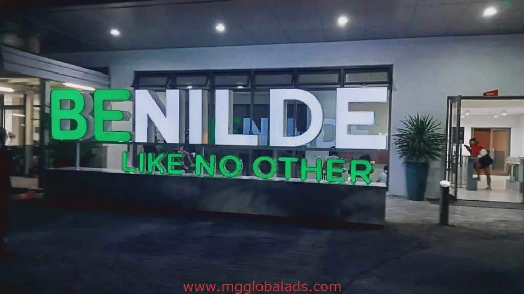 LED outdoor signage for Benilde with LIKE NO OTHER in white and green, Ortigas location, by M&G Global Ads.