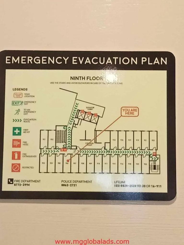 Ninth floor emergency evacuation signage for offices in Makati, showing exits, stairs, and contacts. By M&G Global Ads.