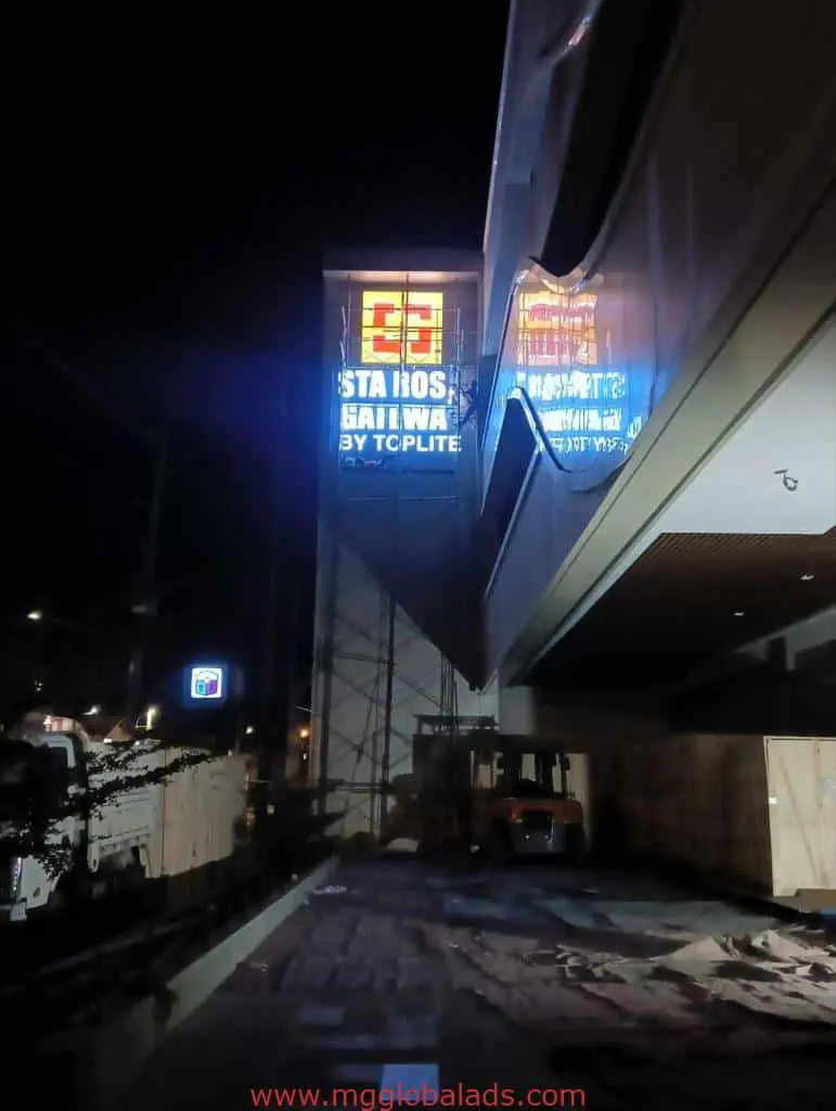 LED signage for Sta. Rosa Railway by TCLPITE in Quezon City, installed at night with construction gear, by M&G Global Ads.