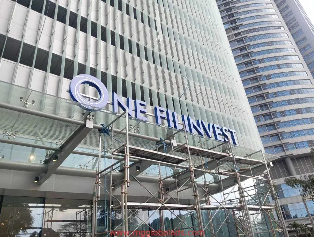 Acrylic office signage for ONE FILINVEST client, with scaffolding, in Mandaluyong, Metro Manila by M&G Global Ads.