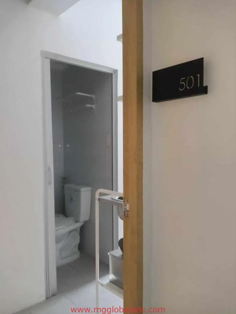 Room number 501 indoor room signage for client in Makati, black sign on white wall by M&G Global Ads.